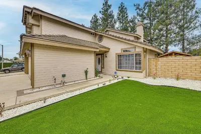 a house with a lawn in front of it at 2 Mi to Victoria Gardens Rancho Cucamonga Haven in Rancho Cucamonga