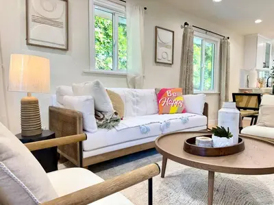 a living room with a white couch and a table at Jies choice- Modern Luxe in Altadena in Altadena