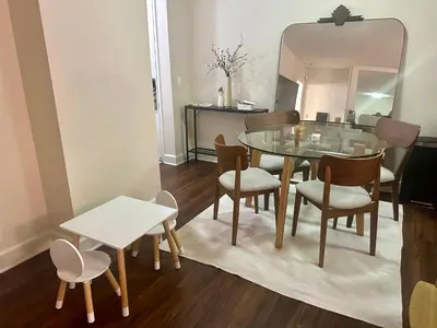 a dining room with a table and chairs and a mirror at Cozy Gem Near Old Town Pasadena in Pasadena