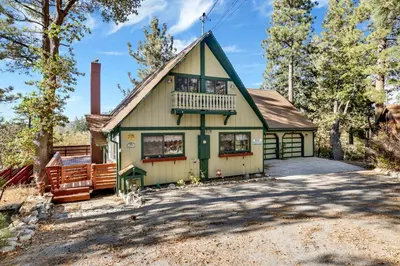 a house with a porch and a balcony at Mountain Hideaway on Maryland #2494 in Big Bear Lake