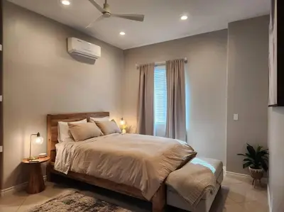 a bedroom with a large bed and a window at Spacious 1 Bed ADU in Encino, Home Away from Home in Los Angeles