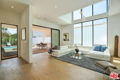 a living room with a couch and a table at Sycamore Ave in Los Angeles