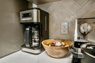 a kitchen with a coffee maker and a bowl of food at Cozy 2BD Retreat in MarinaDelRey!Free Parking&Pool in Los Angeles