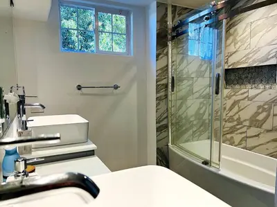 a bathroom with a shower and a sink at Mediterranean Villa-Pool Jacuzzi BBQ-Malibu Bliss in Los Angeles