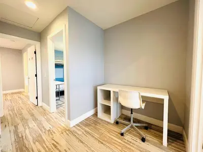 a room with a desk and a chair in it at Huge Family House Vacation Villa VIEW Pool King Bedroom in Walnut