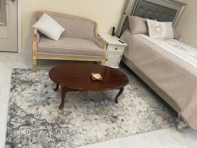 a living room with a couch and a coffee table at Hidden Gem in Stevenson Ranch