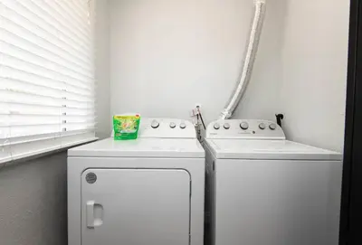 two white refrigerators sitting next to each other in a kitchen at Chic Getaway Cozy Comfortable and Convenient with Two Bedrooms in Los Angeles