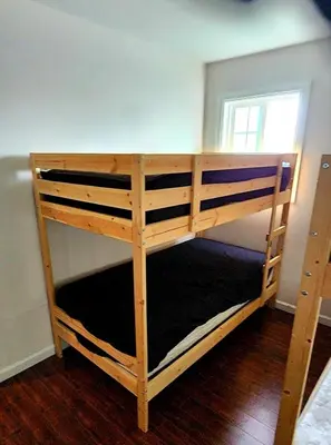 a couple of bunk beds in a room at Westminster Home in Westminster
