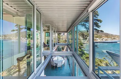 a glass house with a view at Beachfront Villa Broad Beach Direct Beach Access in Malibu
