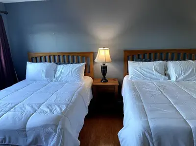 two beds sitting next to each other in a bedroom at Hilltop Oasis Near Palos Verdes in San Pedro