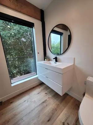 a bathroom with a sink and a mirror at Sumac in Los Angeles