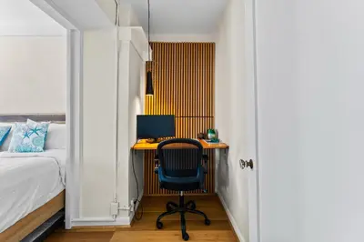 a bedroom with a desk with a computer on it at Ocean View Studio Near Convention Center and Beach in Long Beach