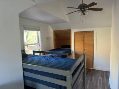 a bedroom with two beds and a ceiling fan at Enjoy Privacy - Pine Mountain - Spacious Home in Pine Mountain Club