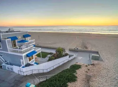 a house on the beach with the ocean at 90210 Beach House Lower Unit in Hermosa Beach