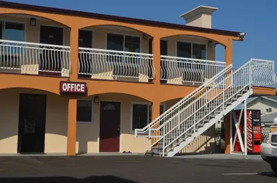 a office building with a staircase on the side of it at Galaxy Inn in Los Angeles