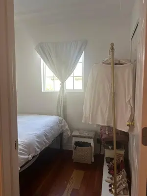 a bedroom with a bed and a window at Cozy Studio In West Hollywood in Los Angeles