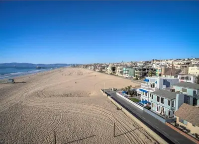 an aerial view of a beach with houses and condos at 90210 Beach House Middle Unit in Hermosa Beach