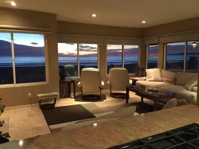 a living room with a view of the ocean at 90210 Beach House Middle Unit in Hermosa Beach