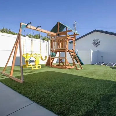 a playground with a slide and a swing at Los Angeles, CA Near Malibu - Pool in Los Angeles