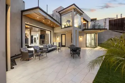 a house with a patio with a living room at New Listing The Skyline Villa by Colby & Conrad in Los Angeles