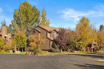 a house on a street with a driveway at BIg Bear G5 Getaway in Big Bear Lake