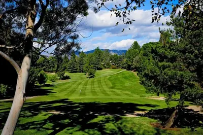a view of a golf course with a green at Adorable 4 bedroom home with Pool & more in Los Angeles