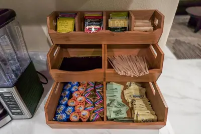 a wooden box filled with different types of food at Disneyland Retreat Fun Family Unit w Game Room, King Beds & EV Friendly - Sleeps up to 14 in Midway City