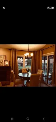 a living room with a table and chairs at Beautiful Mountain Home in Tehachapi