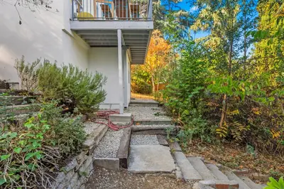 a path leading to a house with a balcony at Peaceful Tranquility w Nature in Los Angeles