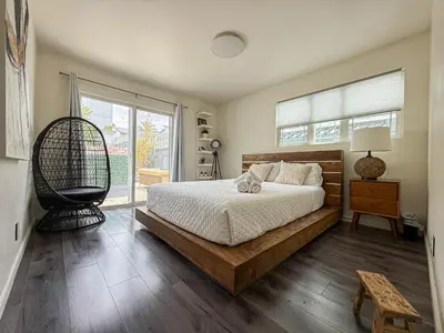 a bedroom with a bed and a large window at Perfect 1-BR Spot Near LAX, SoFi and Forum - MK2-LAD in Los Angeles