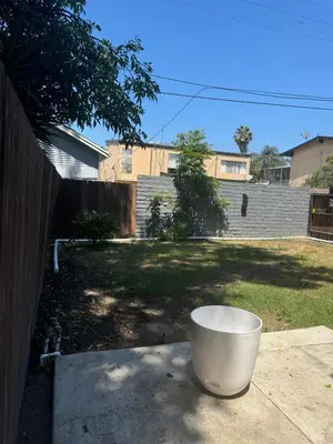 a large white bucket sitting on a patio at Hollywood escape in Los Angeles