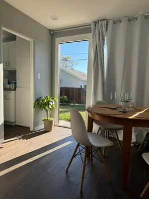 a kitchen and dining room with a table and chairs at Hollywood escape in Los Angeles