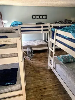 a room with four bunk beds in a room at Homes for Soul Los Angeles in Los Angeles