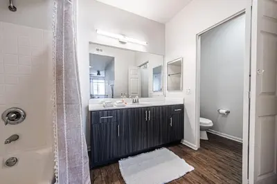 a bathroom with a sink and a toilet and a shower at Modern Townhouse with 4 Bedrooms Near LAX in Los Angeles