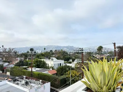 a view of a city from a roof at Melrose Luxe Retreat near The Grove in Los Angeles