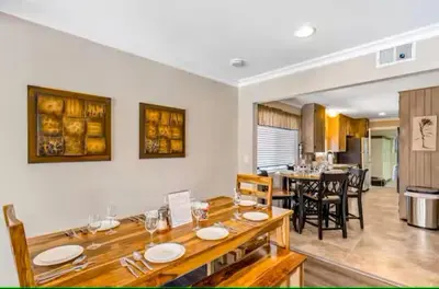 a kitchen and dining room with a table and chairs at Anaheim Dream Haven-disneyland Pool Foosball in Anaheim