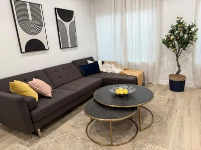a living room with a couch and a table at Comfy & calm rooms near I-10, Temple city in Temple City