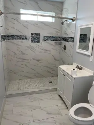 a bathroom with a shower and a toilet and a sink at Los Angeles Cozy Vibe in Los Angeles