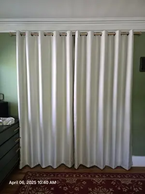 a white curtains in a room with a wall at The Ginkgo House in Pasadena