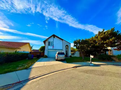 a car parked in the driveway of a house at 1b1b Private and quiet sun roomA in Rancho Cucamonga