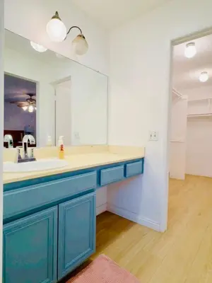 a bathroom with a sink and a large mirror at 1b1b Private and quiet sun roomA in Rancho Cucamonga