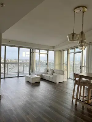 a living room with a couch and a table at NoHo in Los Angeles