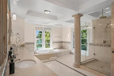 a large bathroom with a tub and a sink at Savona Sanctuary Estate in Los Angeles