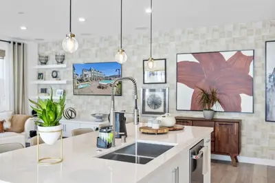 a kitchen with a sink and a living room at #Marbella Lane-Luxury Designer 3BR Home Disneyland in Anaheim