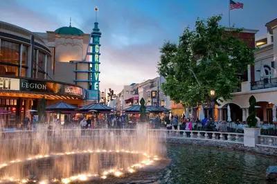 a fountain in the middle of a shopping mall at 3 bedroom apartment by the MrC Hotel and 5 minutes to Rodeo Drive WiFi TV Patio walk to restaurants in Los Angeles