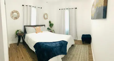 a bedroom with a bed and a window at Cozy Home Away From Home in Mojave