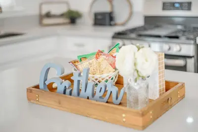 a wooden crate filled with food on a kitchen counter at Centrally Located Charming LA Home with Food Scenes in Monterey Park