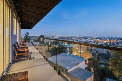 a balcony with a view of a city at Hollywood Hills Luxury Nest in Los Angeles