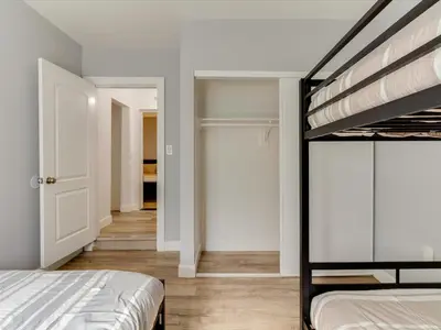 a bedroom with a bunk bed and a hallway at Modern 3 Bedroom Apartment in San Fernando in San Fernando