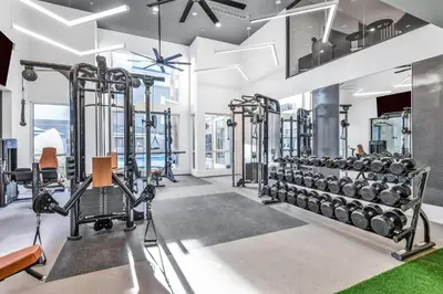 a gym with lots of treadmills and weights at 2BD 2BTH Apartment in Marina Del Rey - Free Parking - 20 mins to LAX in Los Angeles